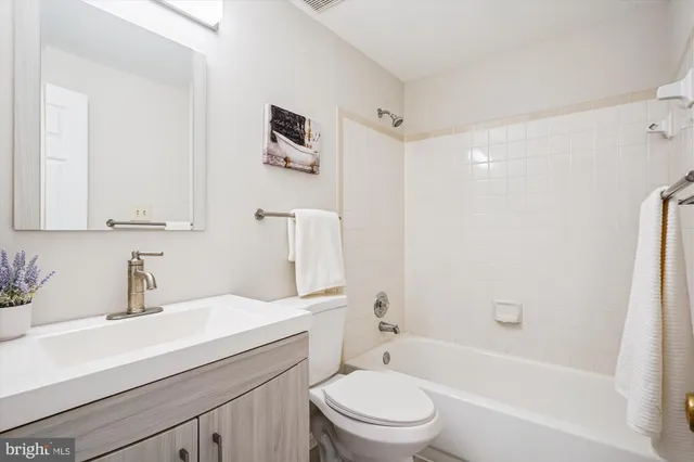 a bedroom with a bed and a balcony