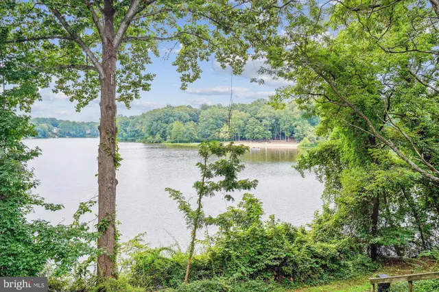 a view of a wooden deck with furniture