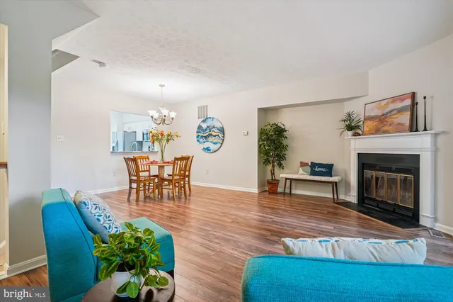 a kitchen with stainless steel appliances a stove a microwave and a refrigerator