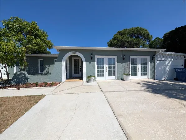 front view of a house with a yard
