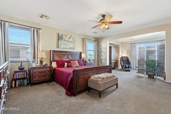 a bedroom with a bed and furniture