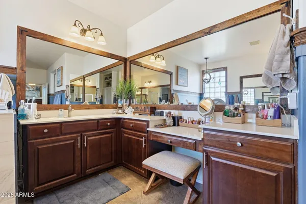 a bath tub sitting next to a bathroom sink