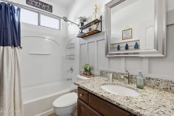 a view of an outside dining space with furniture