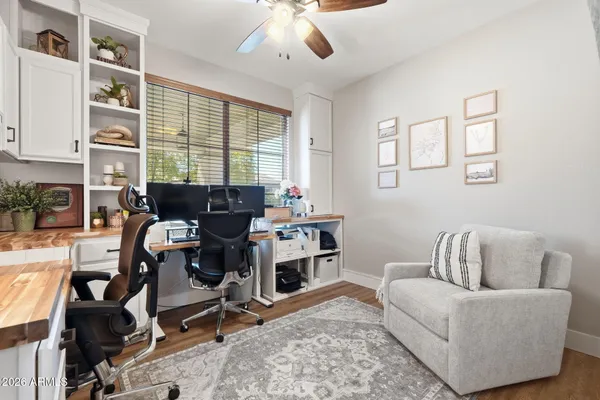 a patio with table and chairs