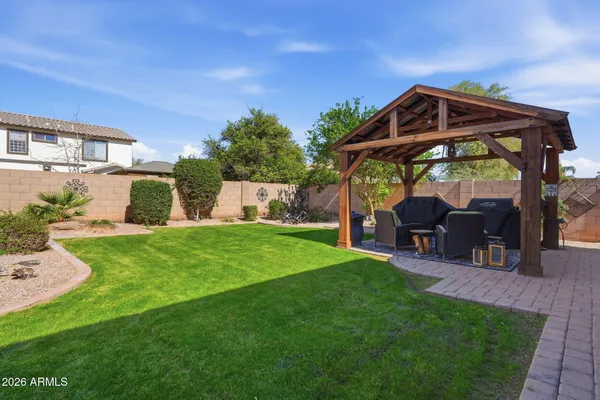 a view of swimming pool with chairs