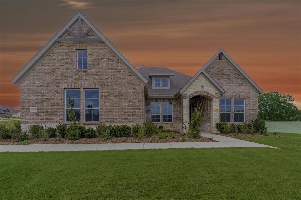 906 Perrin Lane Van Alstyne, TX 75495 - Photo 1 of 30 a front view of a house with a yard and green space