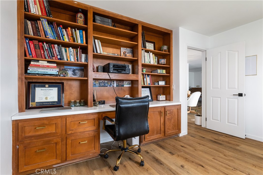 3150 Bluegrass Place Creston, CA 93432 - Photo 29 of 58 a view of a workspace with furniture and wooden floor