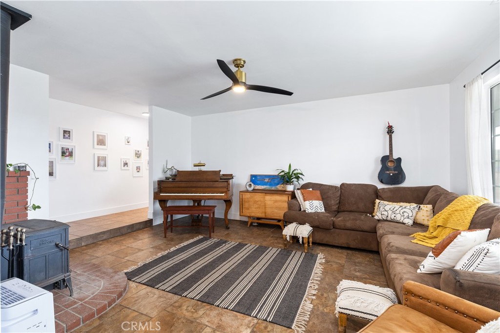3150 Bluegrass Place Creston, CA 93432 - Photo 32 of 58 a living room with furniture and a couch