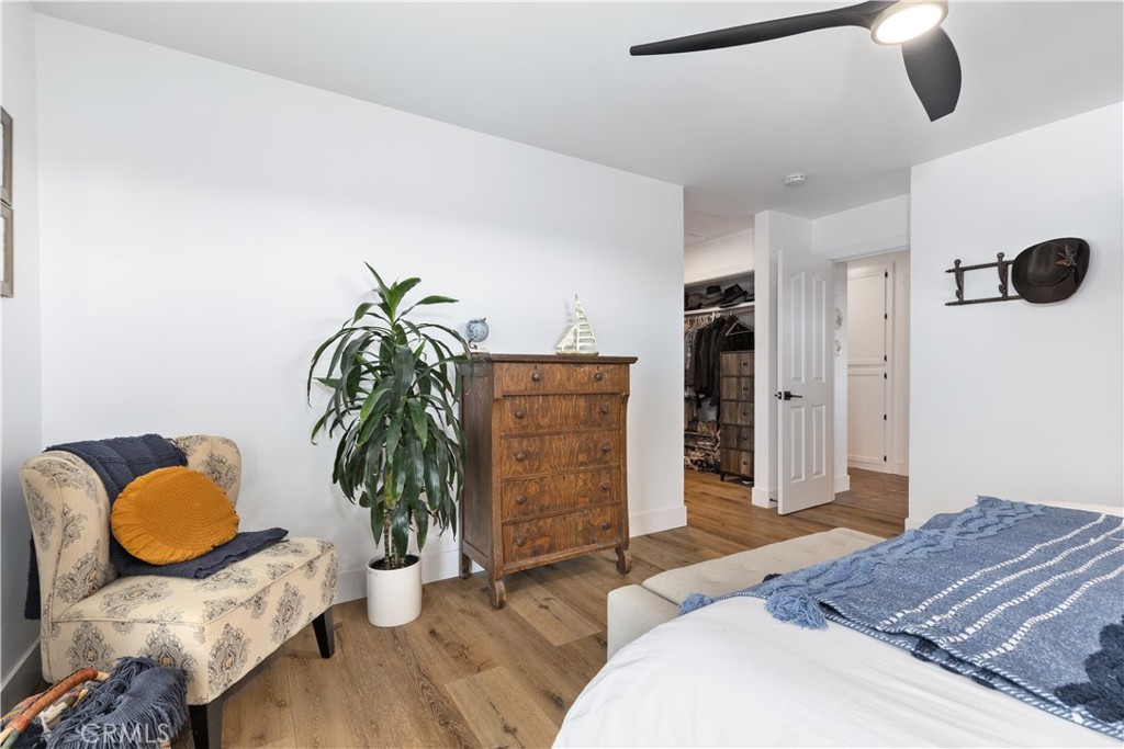 3150 Bluegrass Place Creston, CA 93432 - Photo 40 of 58 a bedroom with furniture and wooden floor