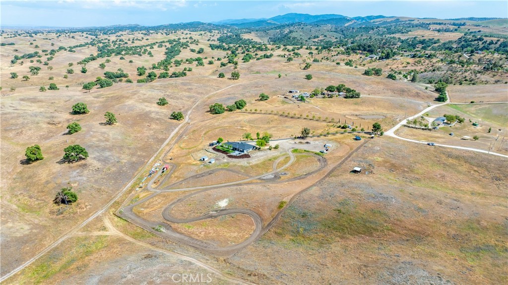 3150 Bluegrass Place Creston, CA 93432 - Photo 57 of 58 an aerial view of a house with a yard and ocean view