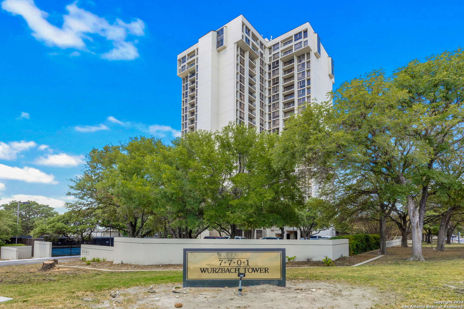 7701 Wurzbach Road, Unit 2005 San Antonio, TX 78229 - Photo 1 of 1 a view of a building with garden space