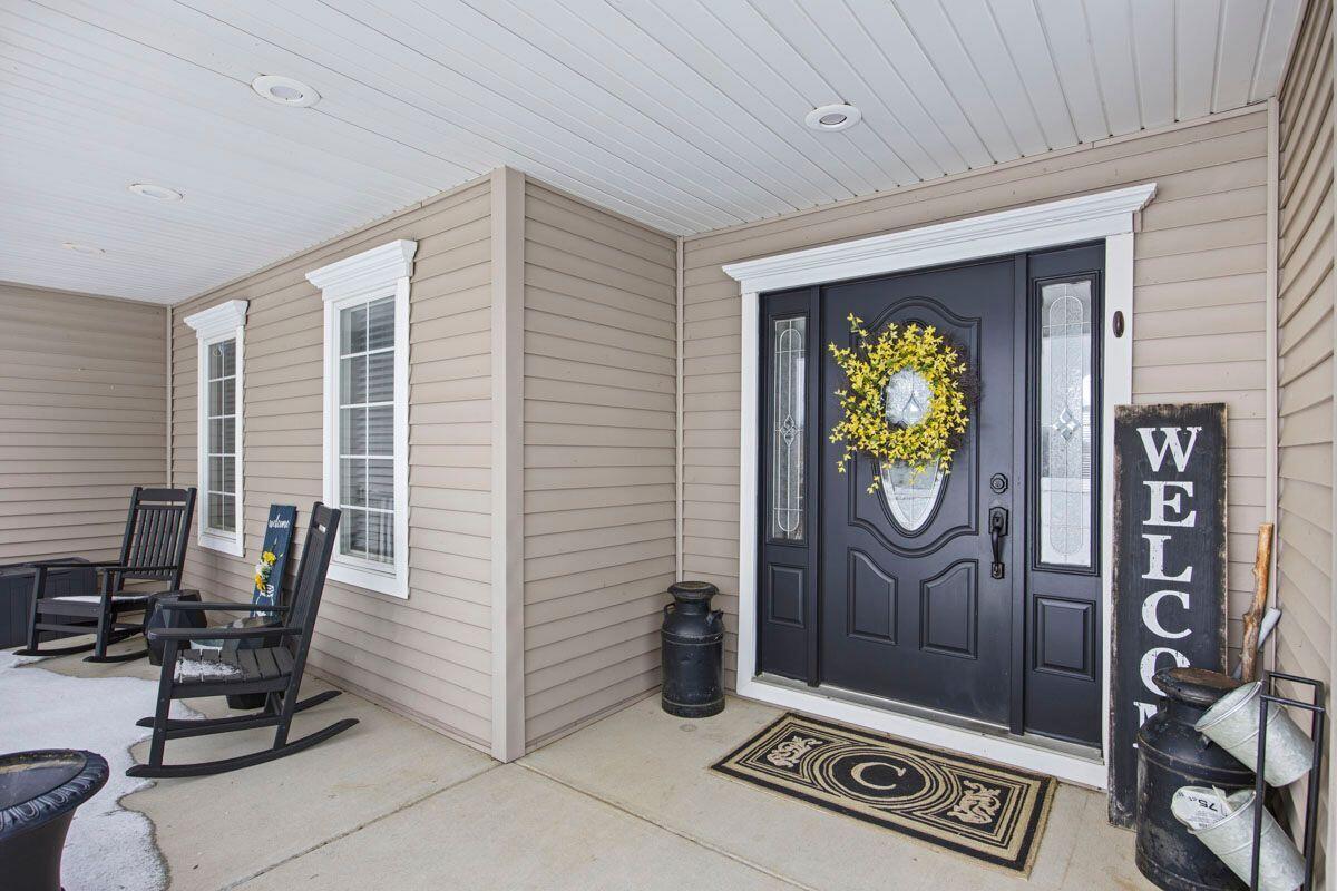 280 North Black Road Trufant, MI 49347 - Photo 2 of 32 black front door