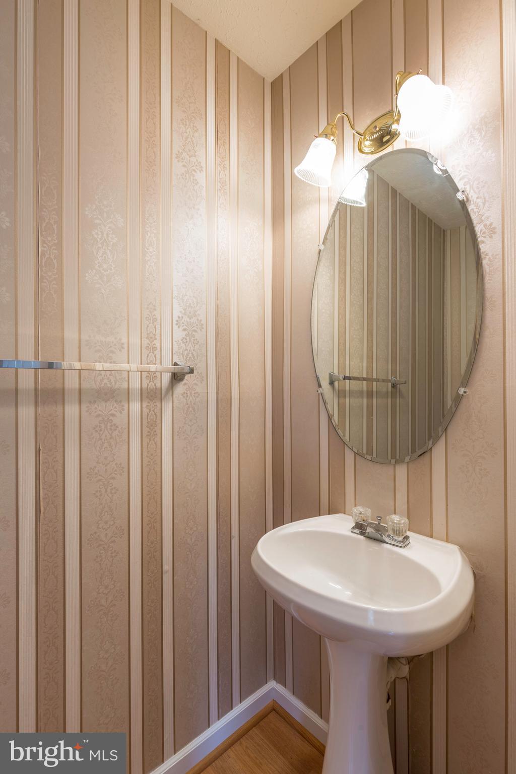 1820 Triple Feather Road, Unit 86 Severn, MD 21144 - Photo 11 of 22 Powder Room on the Main Level