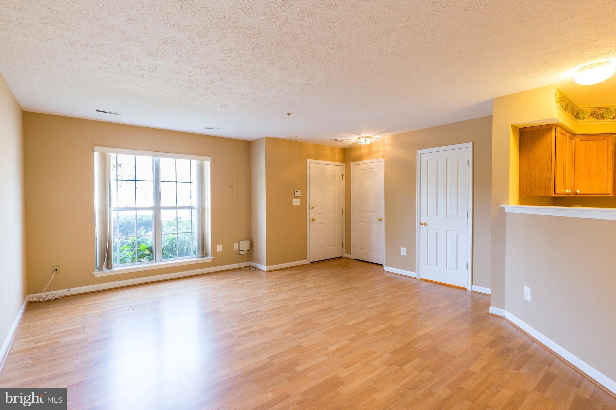1820 Triple Feather Road, Unit 86 Severn, MD 21144 - Photo 3 of 22 Open Living/Dining Area on Main Level