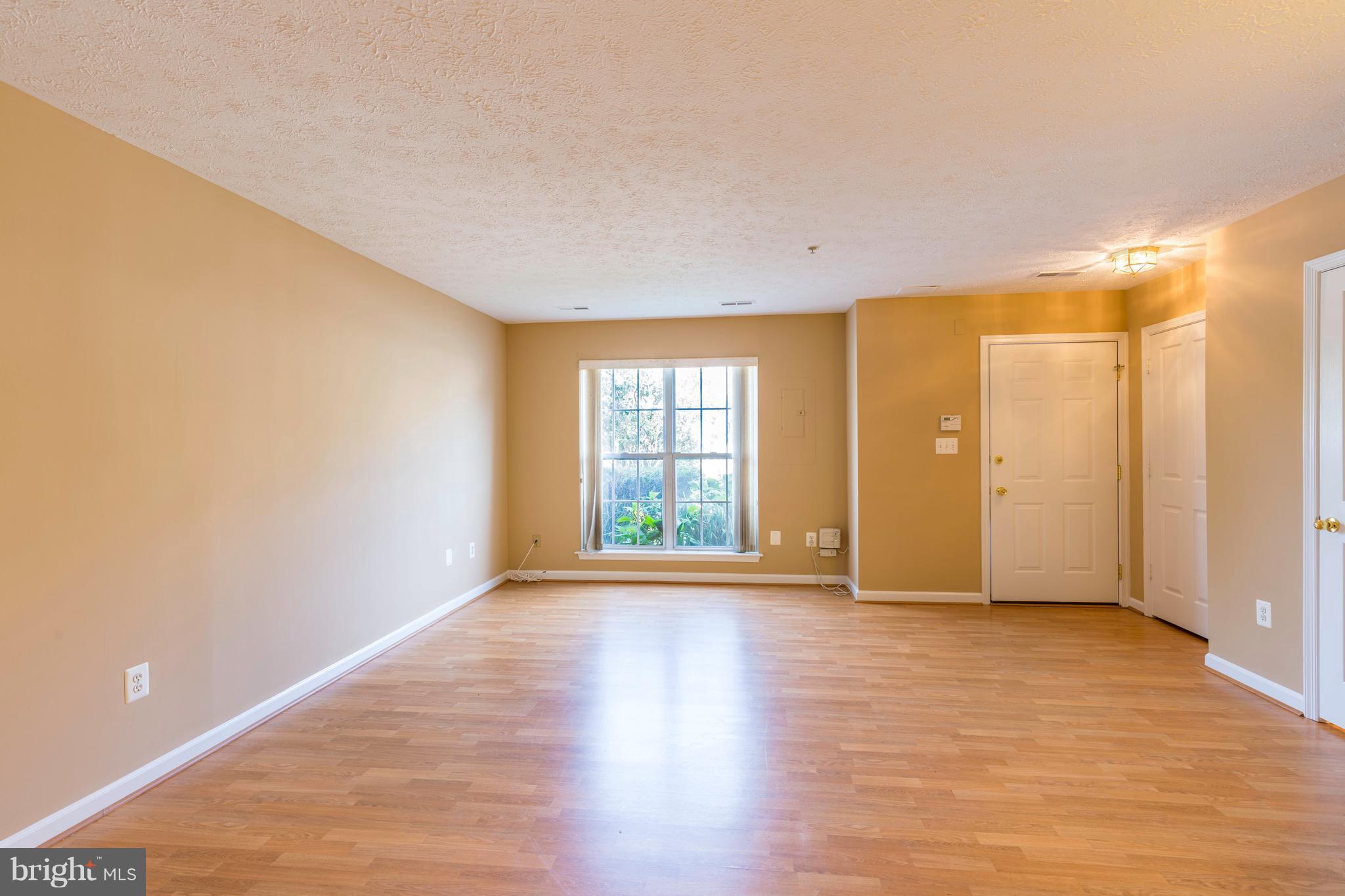 1820 Triple Feather Road, Unit 86 Severn, MD 21144 - Photo 4 of 22 Open Living/Dining Area on Main Level