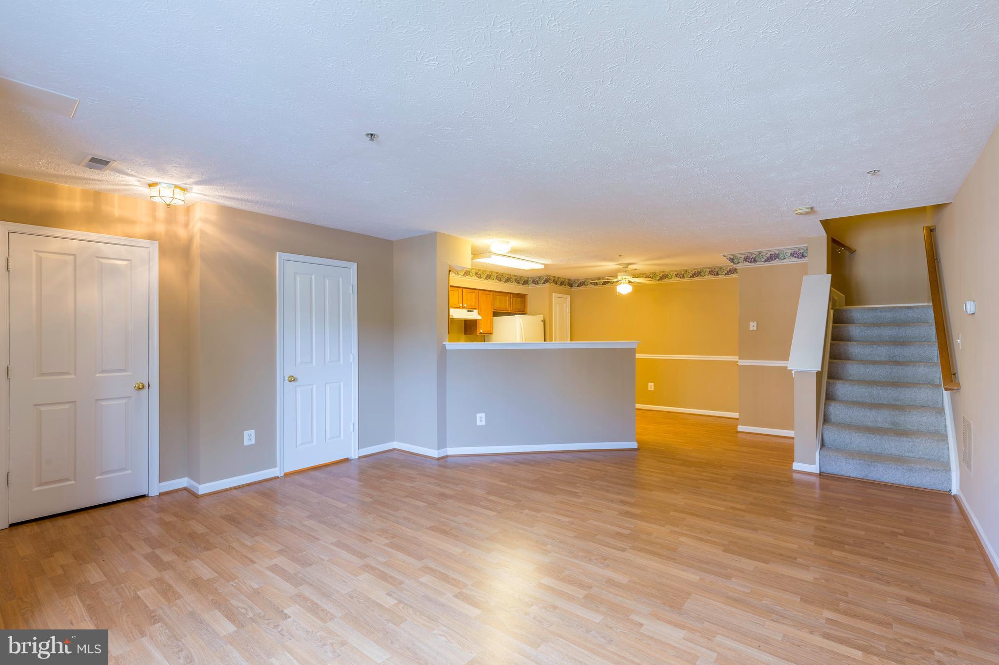 1820 Triple Feather Road, Unit 86 Severn, MD 21144 - Photo 6 of 22 Open Living/Dining Area on Main Level