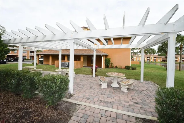 a view of a swimming pool and a yard