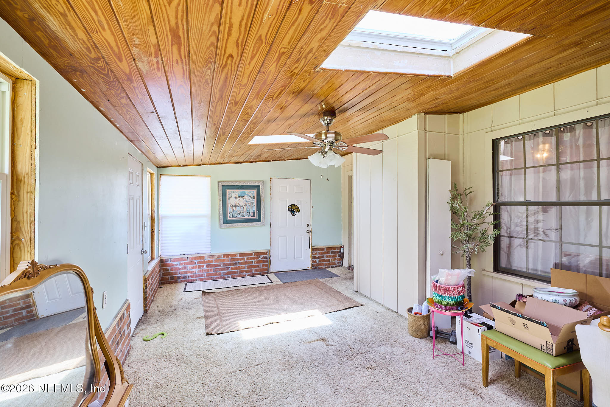 8965 San Rae Road Jacksonville, FL 32257 - Photo 29 of 46 a living room with furniture and a window