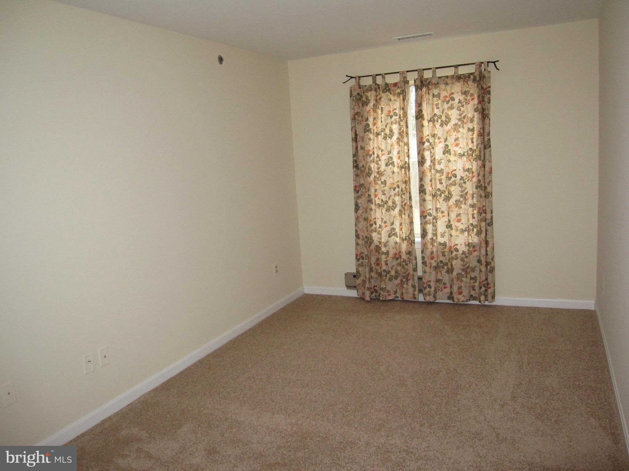 21 Rain Flower Path, Unit 103 Sparks, MD 21152 - Photo 17 of 27 Den