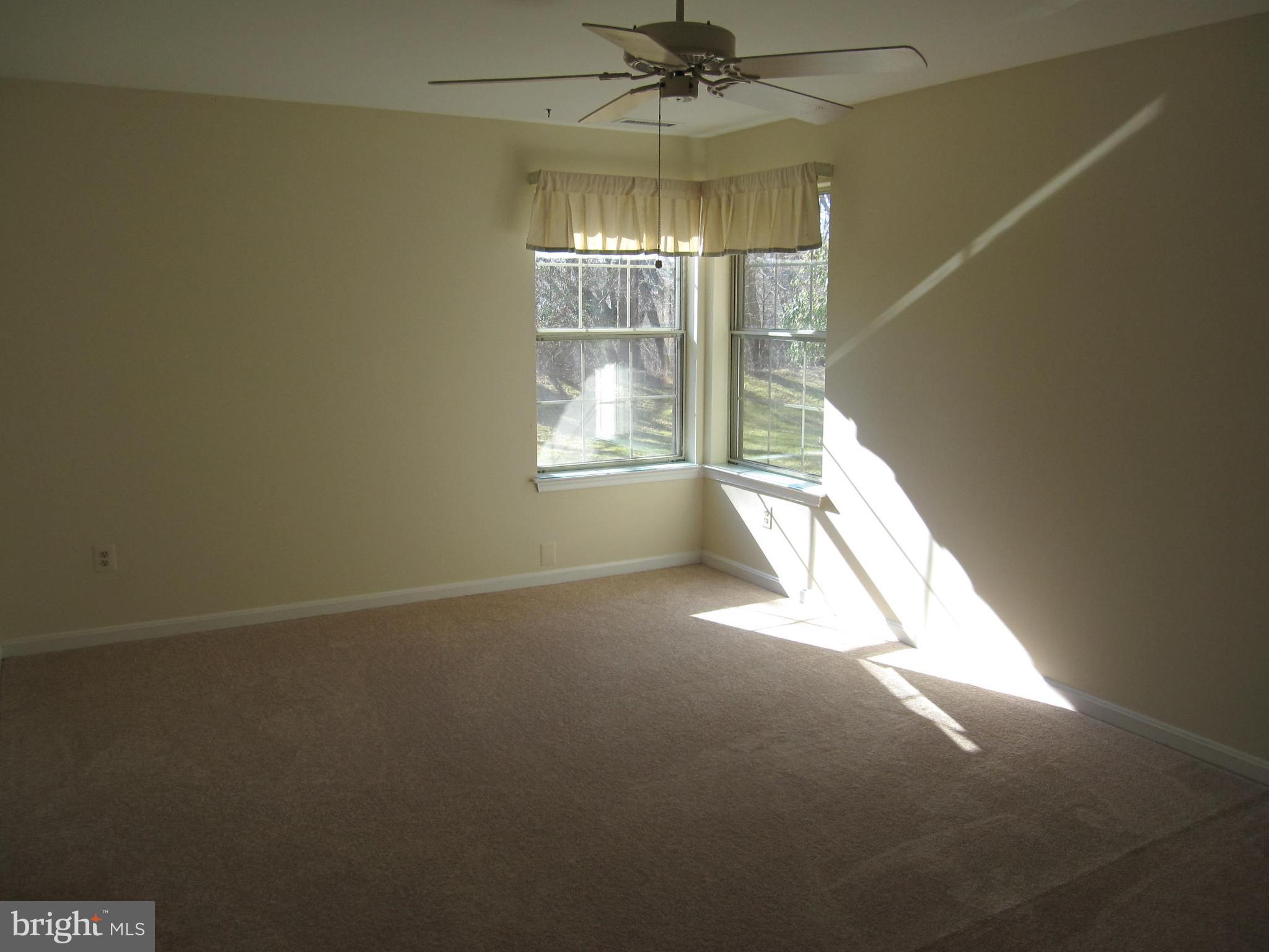 21 Rain Flower Path, Unit 103 Sparks, MD 21152 - Photo 21 of 27 Bedroom