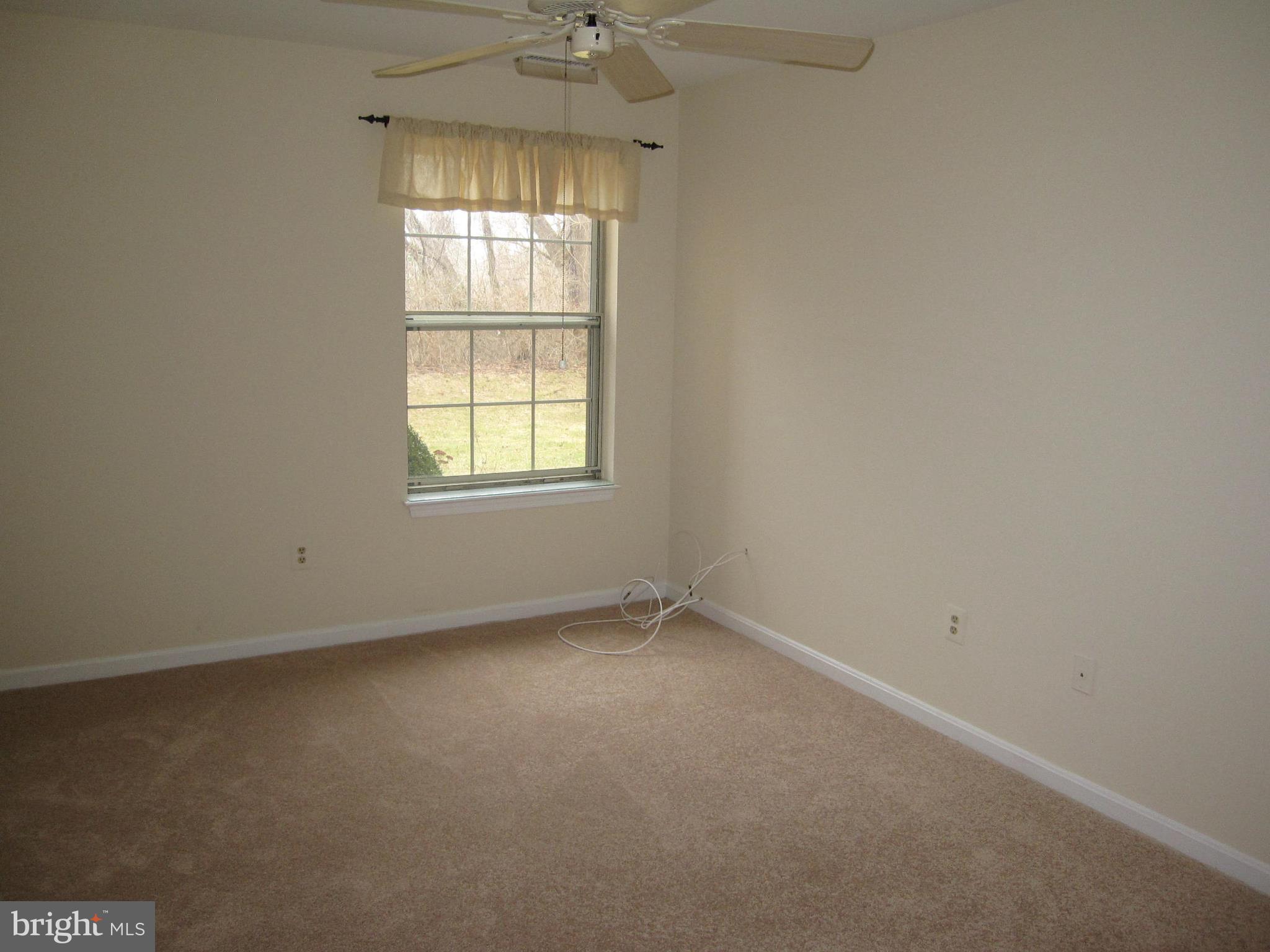 21 Rain Flower Path, Unit 103 Sparks, MD 21152 - Photo 25 of 27 Bedroom