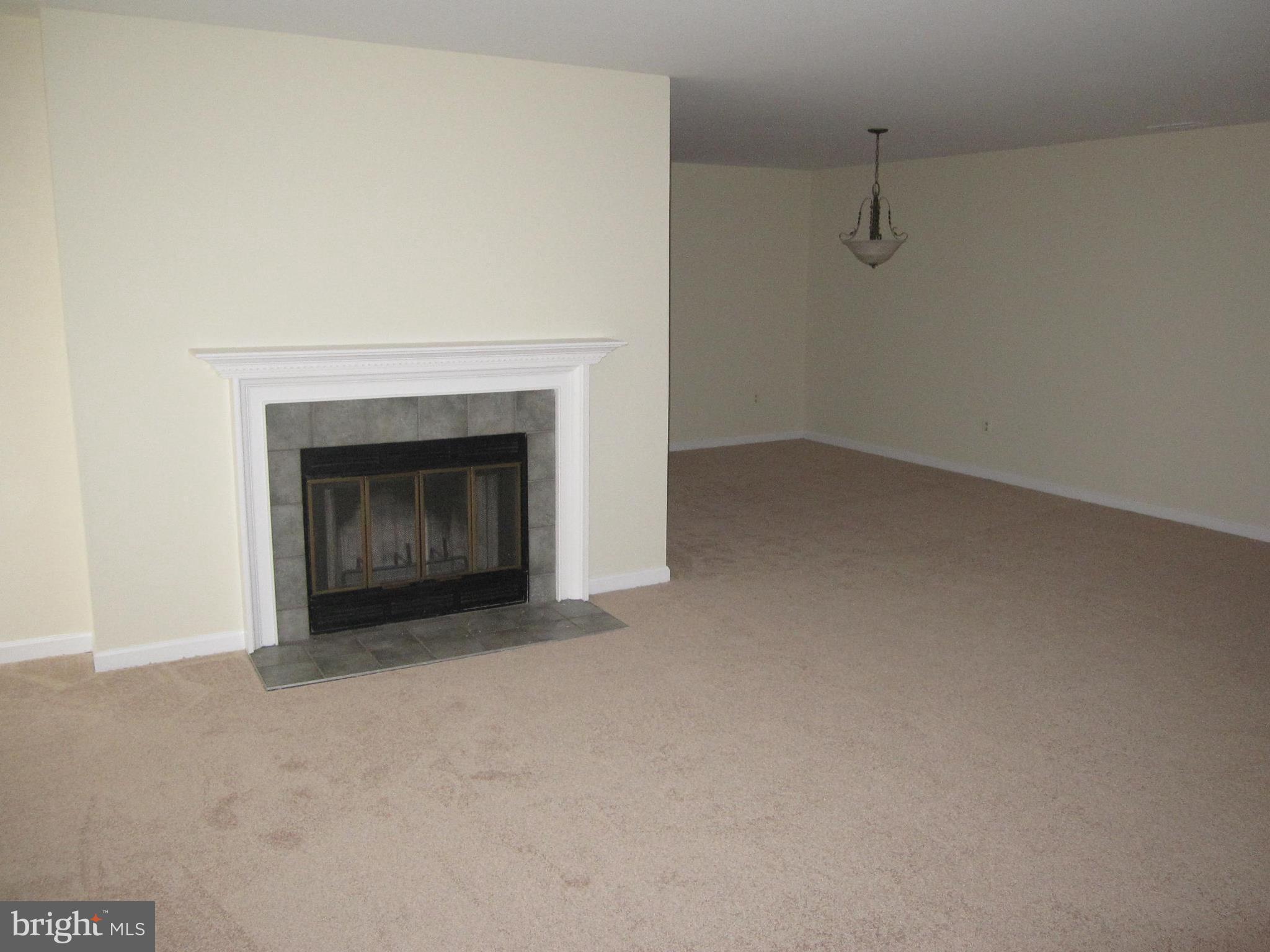 21 Rain Flower Path, Unit 103 Sparks, MD 21152 - Photo 9 of 27 Living Room