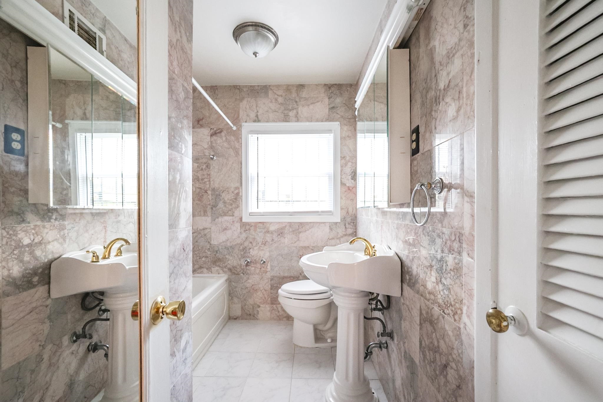 5136 Mason Road Memphis, TN 38117 - Photo 9 of 15 a bathroom with a sink toilet and shower