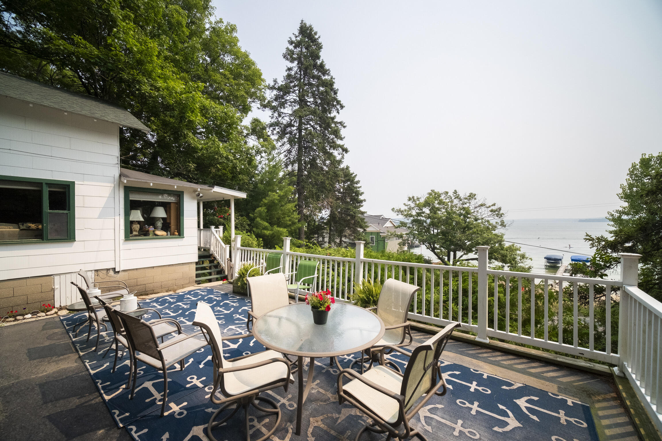 8368 Portage Point Drive Onekama, MI 49675 - Photo 14 of 68 Patio overlooking Lake