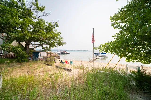 $1,550,000 | 8368 Portage Point Drive, Onekama, MI 49675