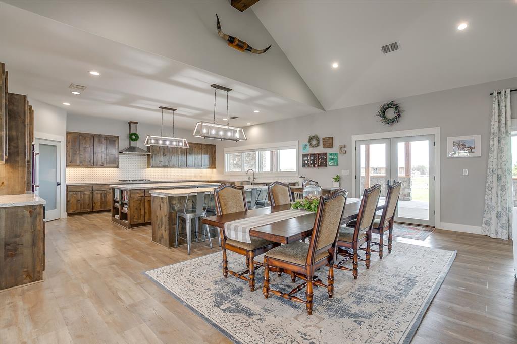 19611 North County Line Road Ponder, TX 76259 - Photo 15 of 40 a view of a dining room with furniture