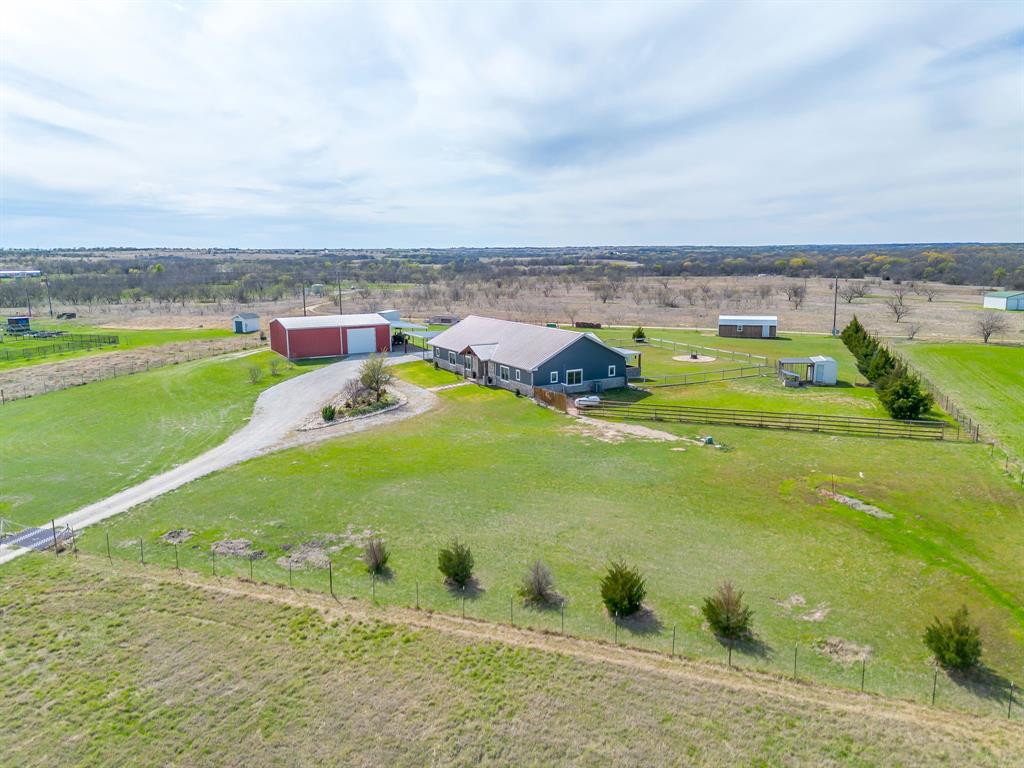 19611 North County Line Road Ponder, TX 76259 - Photo 2 of 40 a view of a water with an ocean beach