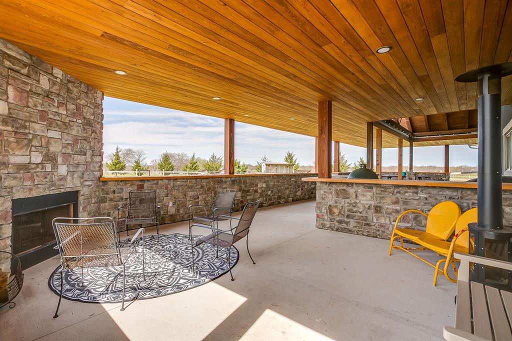 19611 North County Line Road Ponder, TX 76259 - Photo 34 of 40 a swimming pool with outdoor seating
