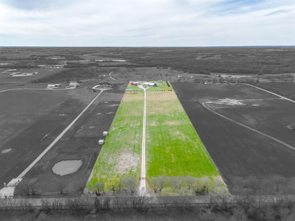 19611 North County Line Road Ponder, TX 76259 - Photo 5 of 40 a view of a yard with an ocean view