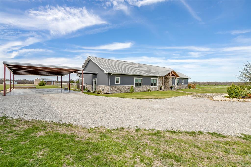 19611 North County Line Road Ponder, TX 76259 - Photo 7 of 40 a view of house with outdoor space and swimming pool