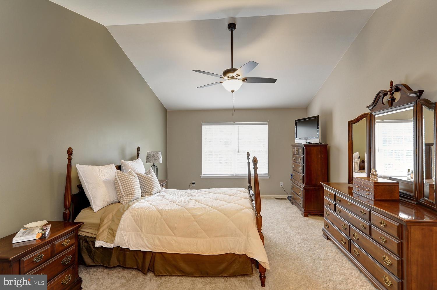 17 Windsor Pond Road Princeton Junction, NJ 08550 - Photo 13 of 20 a bedroom with a bed and wooden floor
