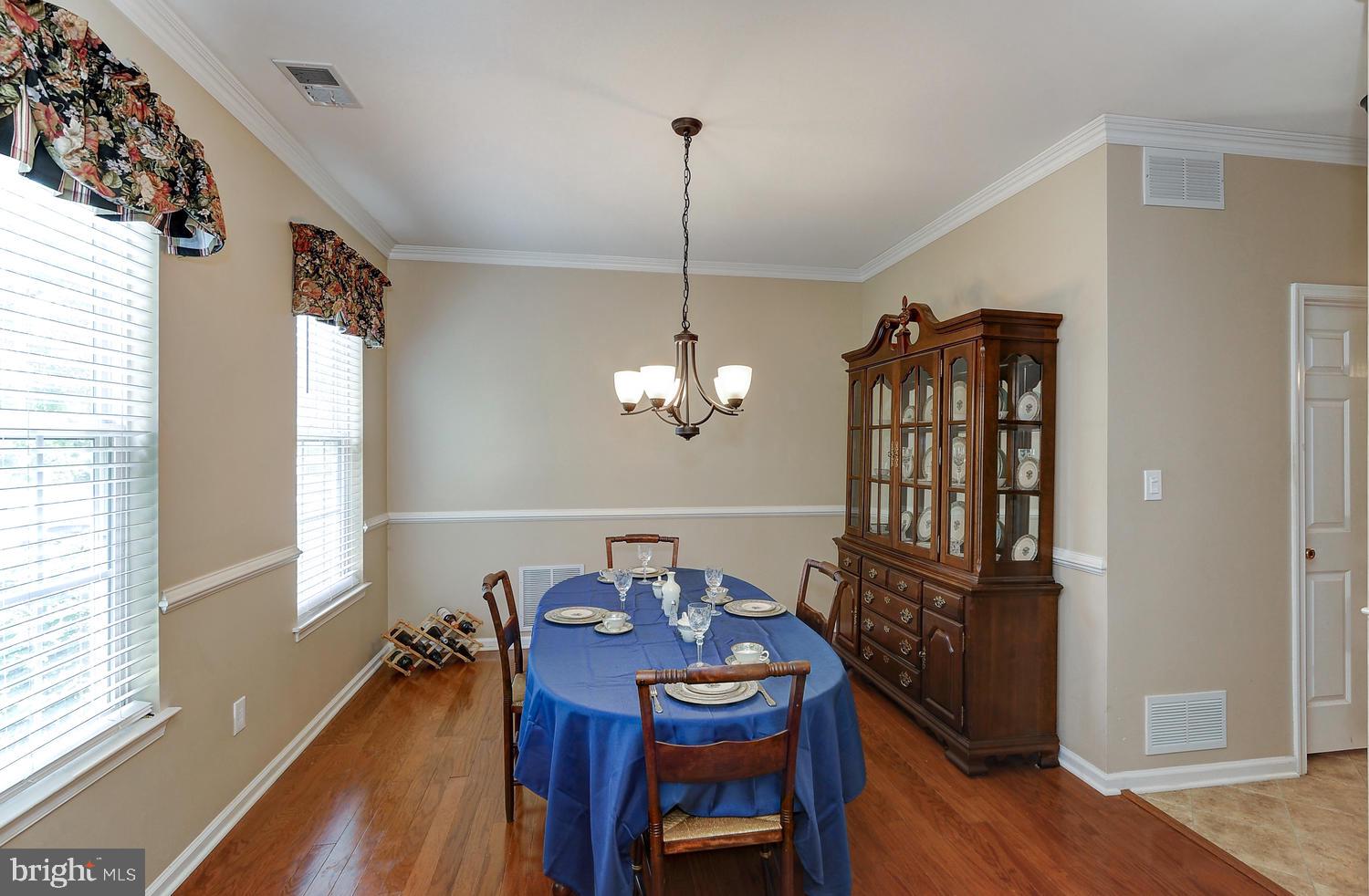 17 Windsor Pond Road Princeton Junction, NJ 08550 - Photo 3 of 20 a view of a dining room with furniture and window