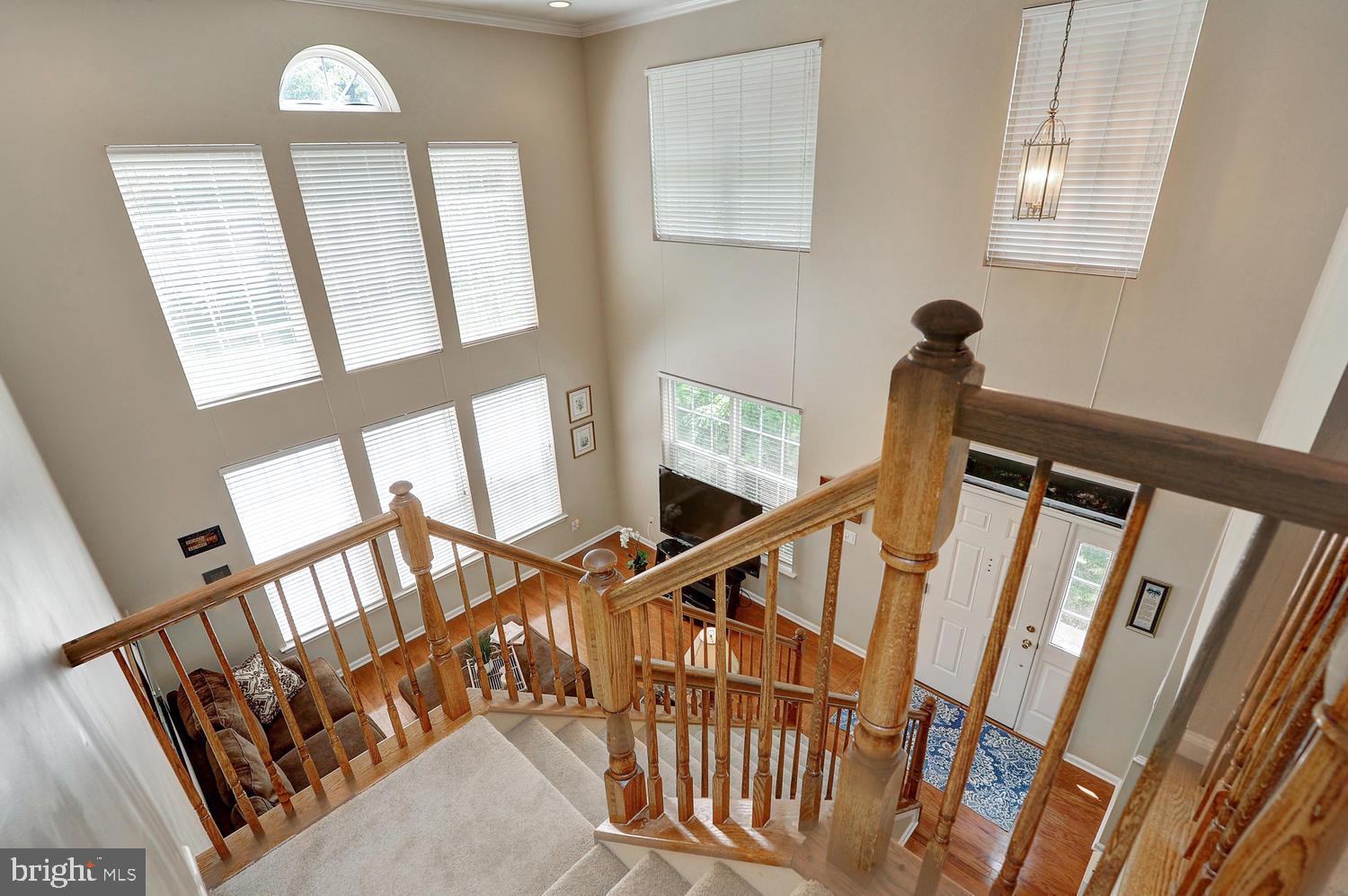 17 Windsor Pond Road Princeton Junction, NJ 08550 - Photo 6 of 20 a view of an entryway with wooden floor