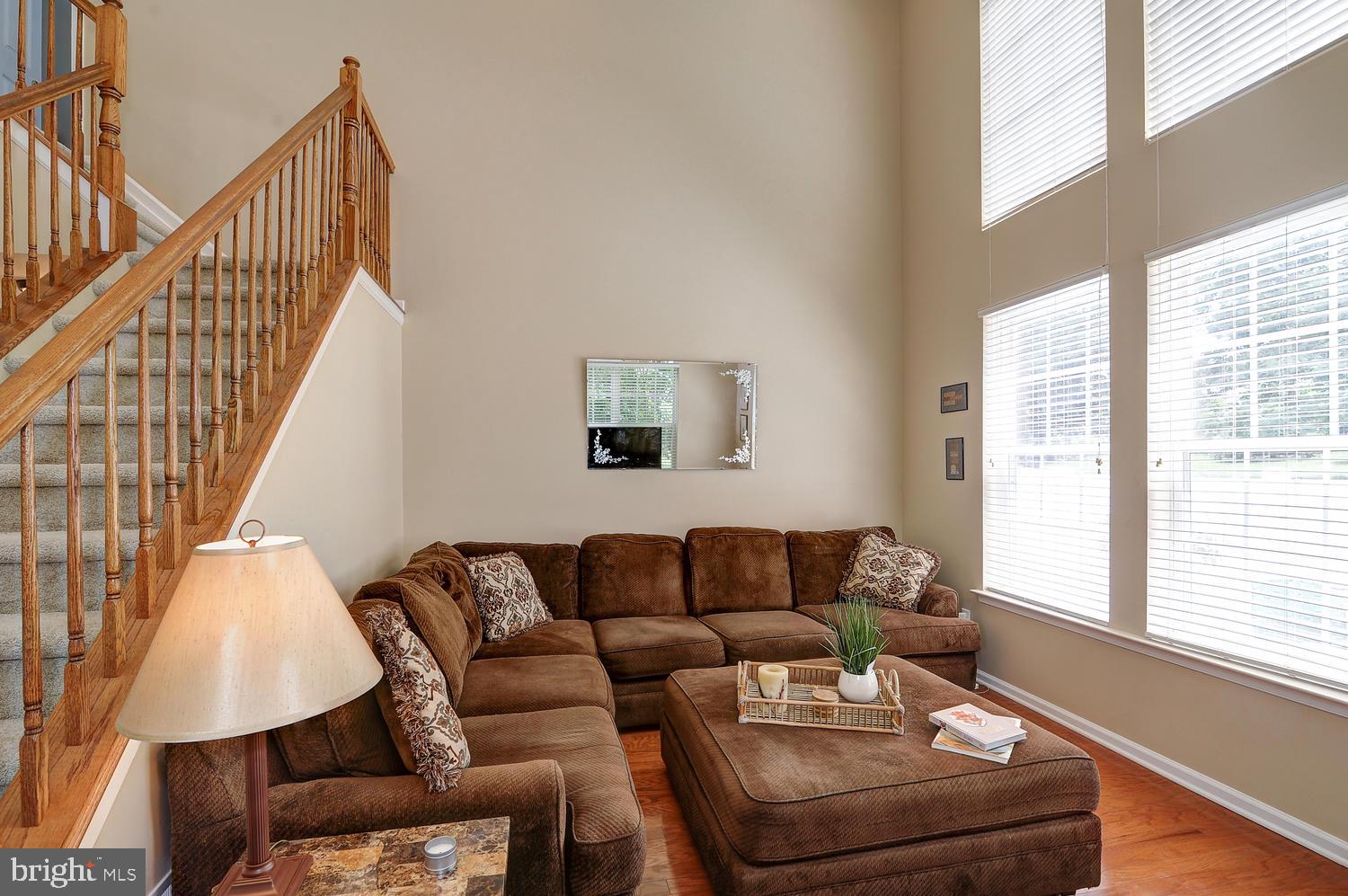 17 Windsor Pond Road Princeton Junction, NJ 08550 - Photo 7 of 20 a living room with furniture and a window