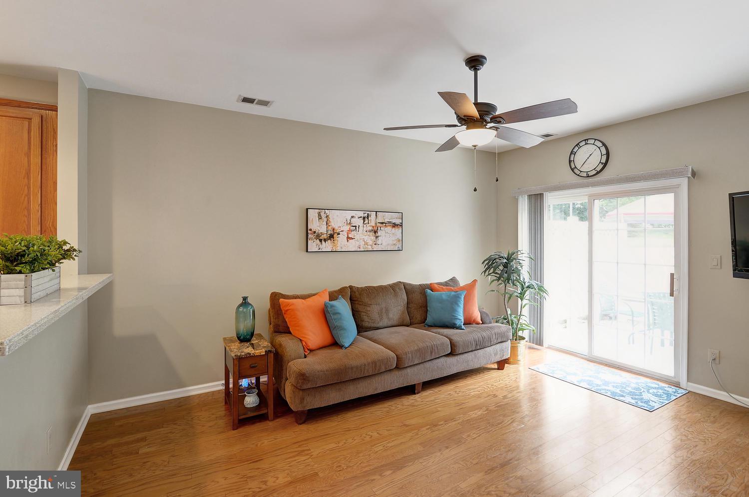 17 Windsor Pond Road Princeton Junction, NJ 08550 - Photo 8 of 20 a living room with furniture and a window