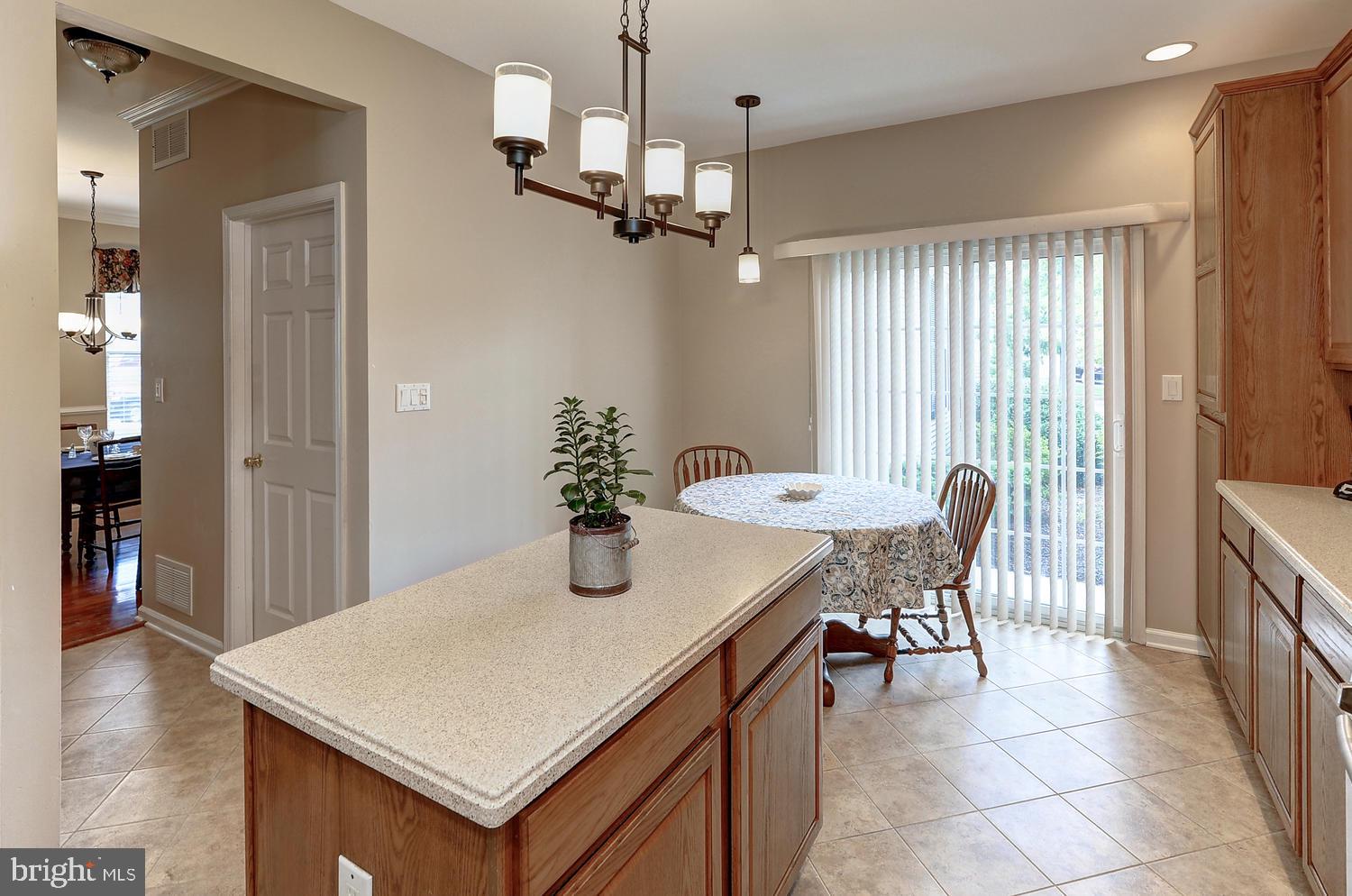 17 Windsor Pond Road Princeton Junction, NJ 08550 - Photo 10 of 20 a view of a dining room with furniture and wooden floor