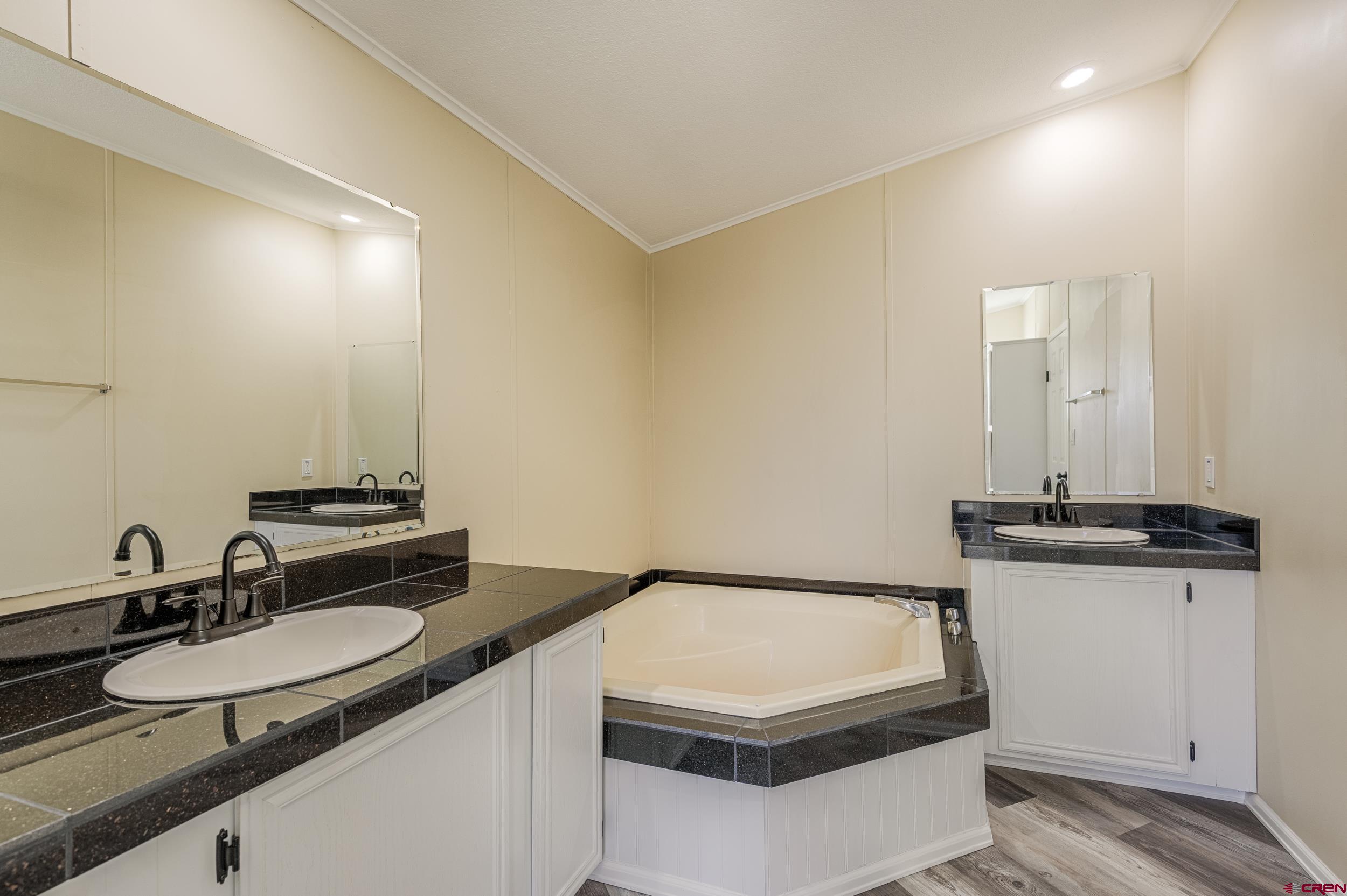1312 Pitchfork Road Montrose, CO 81401 - Photo 21 of 42 Primary Bath - Double Vanity & Soaking Tub