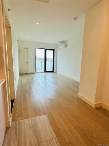 a bathroom with a tub a sink and a shower