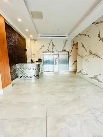 a front view of building with lot of windows