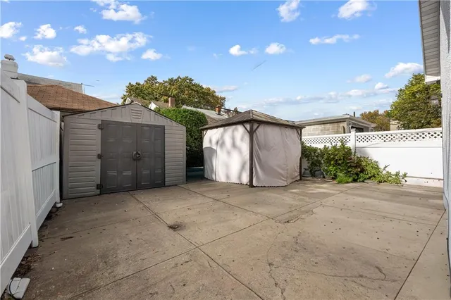 a view of a house with a yard and garage