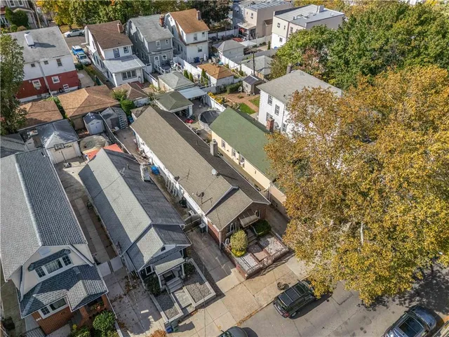 an aerial view of a city with lots of residential buildings