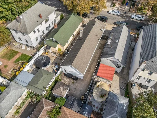 an aerial view of a house with outdoor space