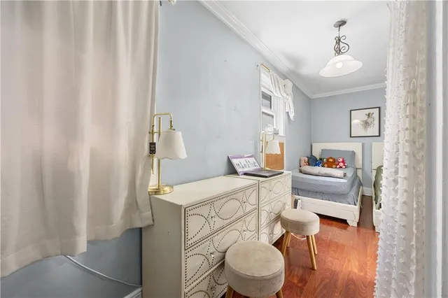 a bathroom with a toilet a sink and a mirror