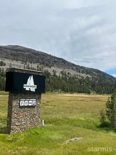 a view of a lake with a mountain in the background