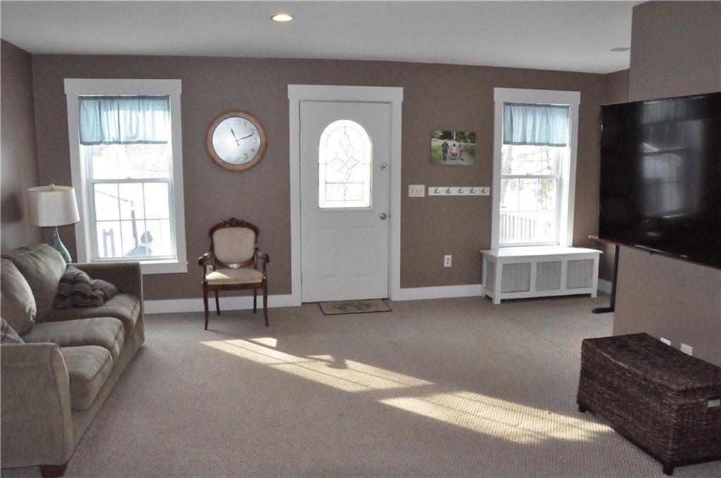 39 Norway Road Bangor, ME 04401 - Photo 16 of 33 Large, inviting family room leads to...