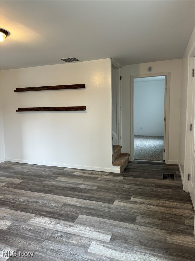 5155 Center Road Philo, OH 43771 - Photo 8 of 37 Spare room featuring dark hardwood / wood-style flooring